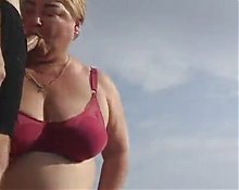 Mother-in-law sucks my dick on the beach and gets cum in her mouth1