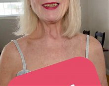 Older stepmom Danielle Dubonnet shows her tits to a fan on camera