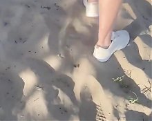 Lady Oups Butt Plug on the Beach in Micro Skirt